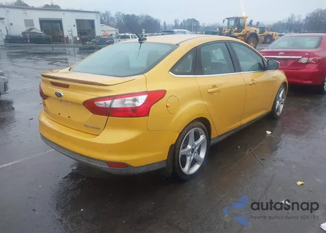 2012 Ford Focus Titanium z USA, uszkodzony, nr VIN 1FAHP3J26CL345722